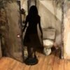 Image of half-scale 2-dimentional shadow girl holding a knife